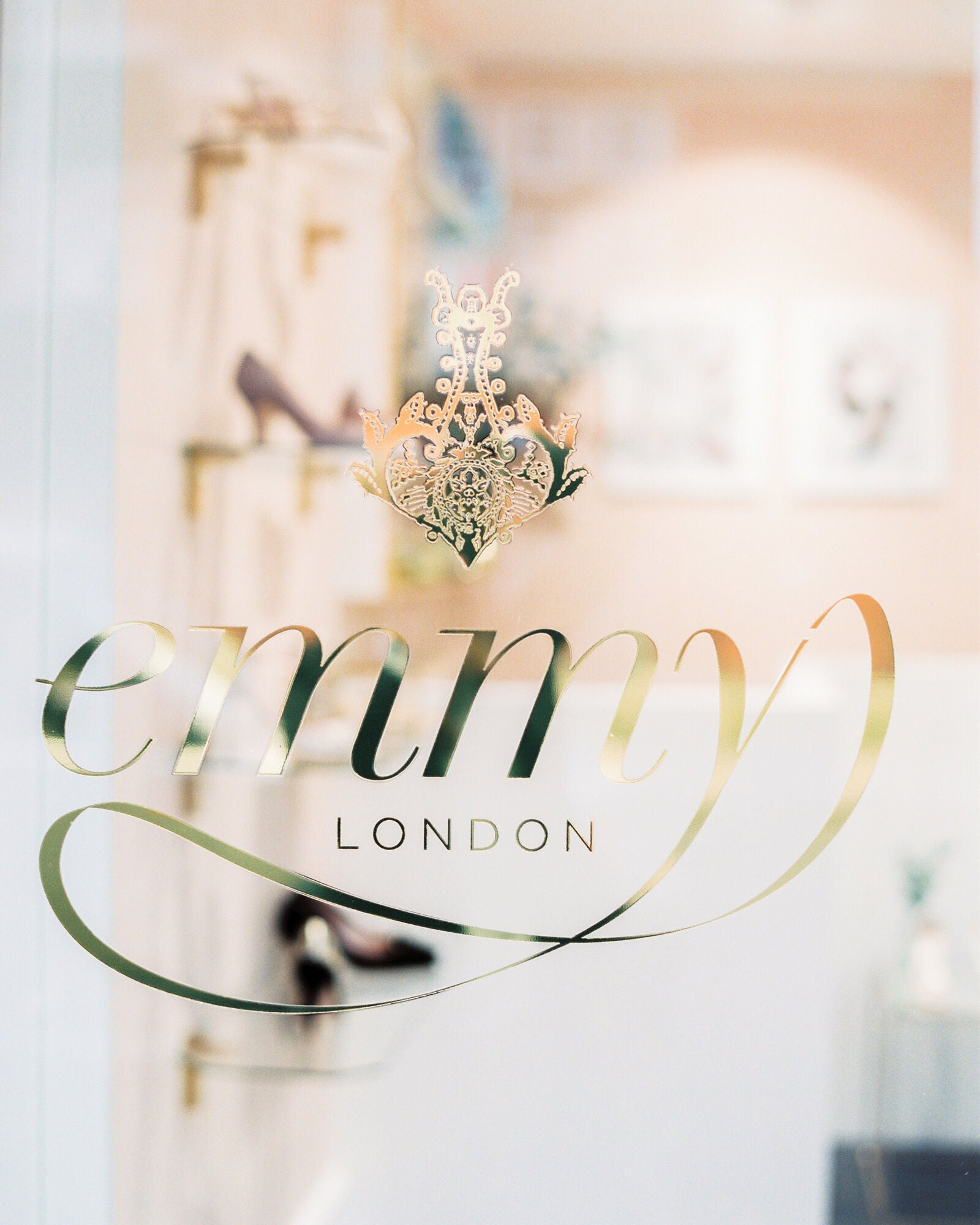 Emmy London Gold Logo On Boutique Door card image