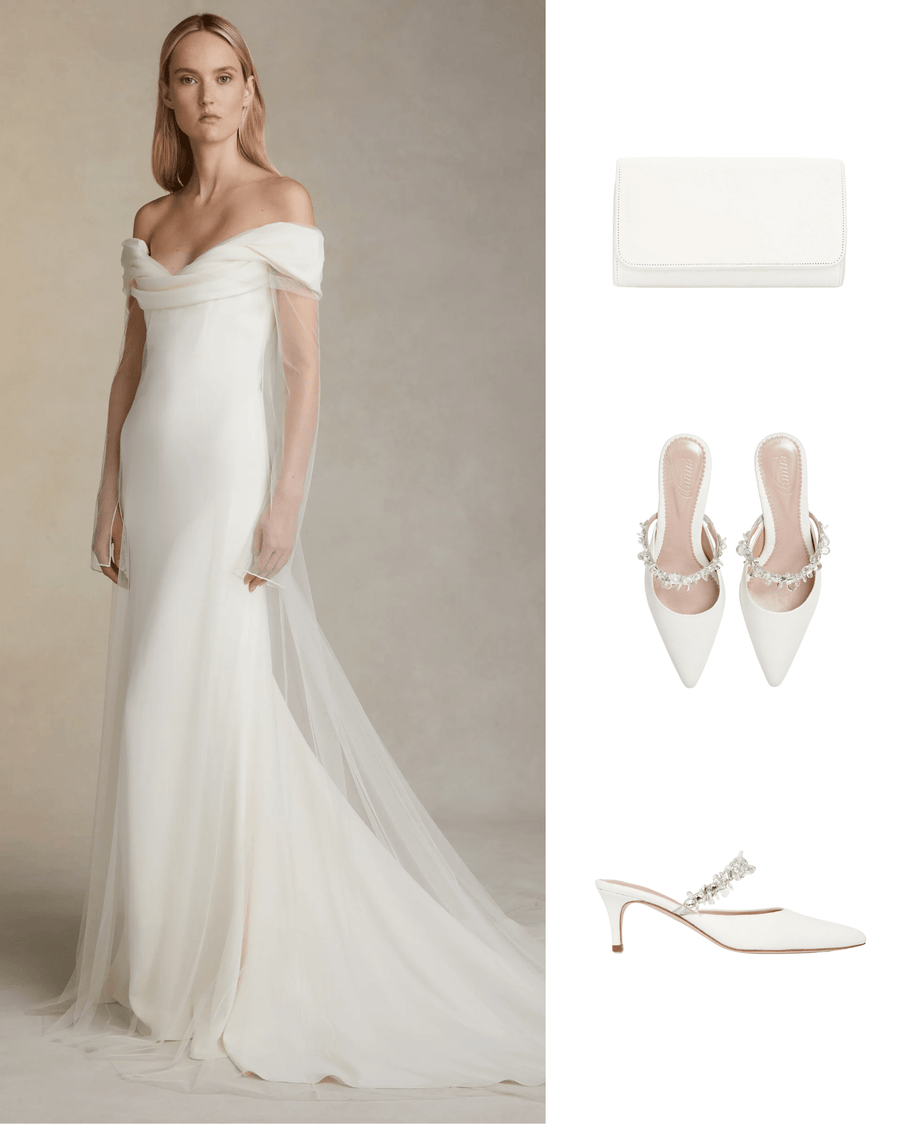 Elegant white heels with a pointed toe and a delicate embellishment on the strap. The model is wearing a stunning off-the-shoulder wedding gown, standing against a soft, neutral background that enhances the ethereal quality of the outfit. The heels feature a modest heel height, complementing the graceful silhouette of the dress. image