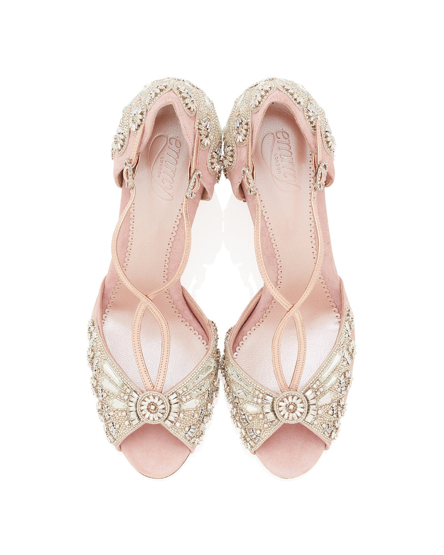 Elegant open-toe heels featuring intricate beading and embellishments on a soft pink base. The shoes are displayed from a top-down angle against a white background, showcasing their delicate design and craftsmanship. image