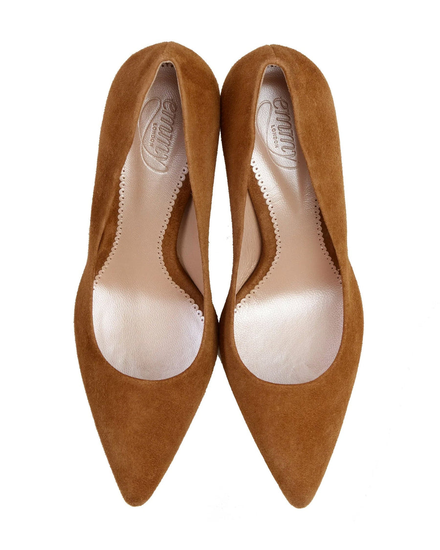 Pointed-toe shoes made of suede, featuring a sleek design with a low-cut vamp. The shoes are displayed from a top-down angle against a white background, highlighting their elegant silhouette. image