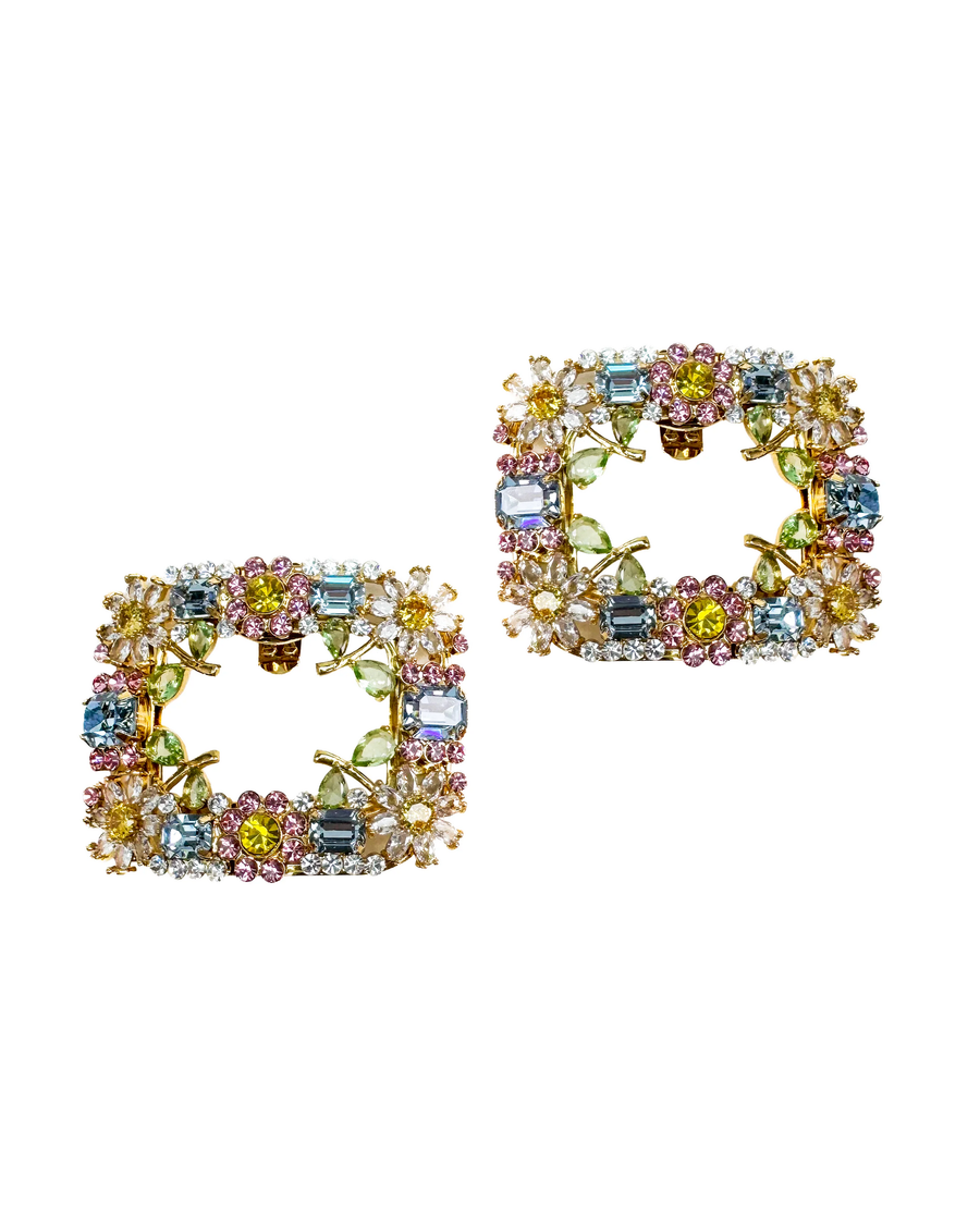 Pair of multicolored crystal shoe clips on a white background image