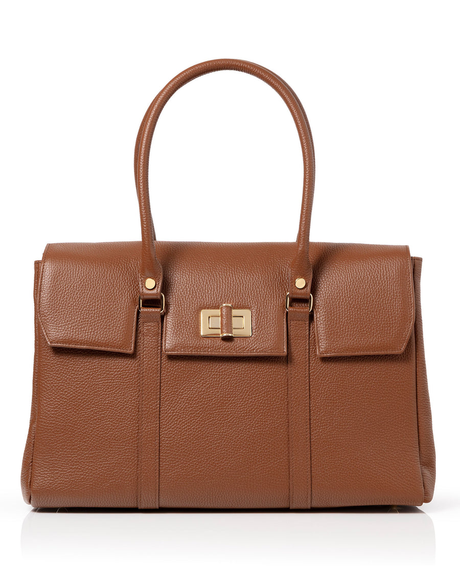 A structured brown pebbled leather handbag with double top handles, a central front flap with a gold-tone turn-lock clasp, and side straps with gold-tone rivets, shown on a white background. image