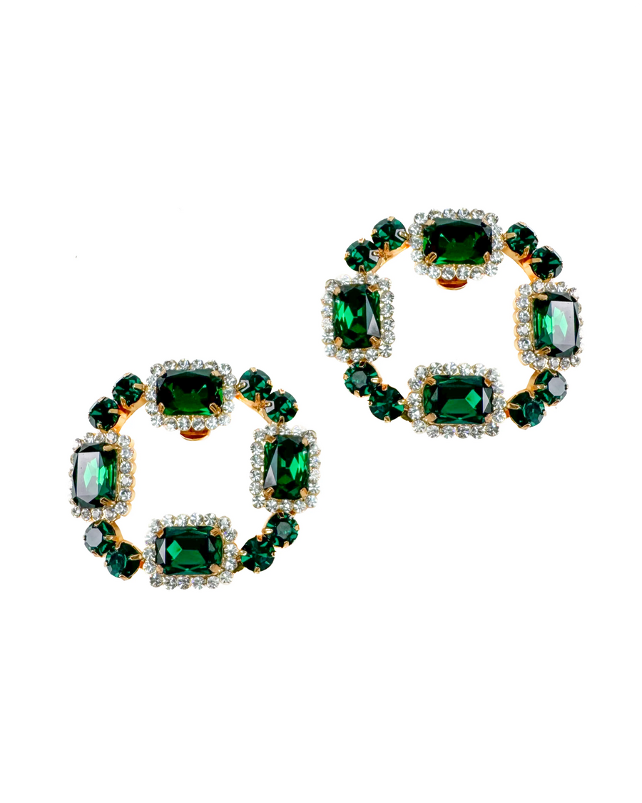 Pair of emerald green crystal shoe clips on a white background image