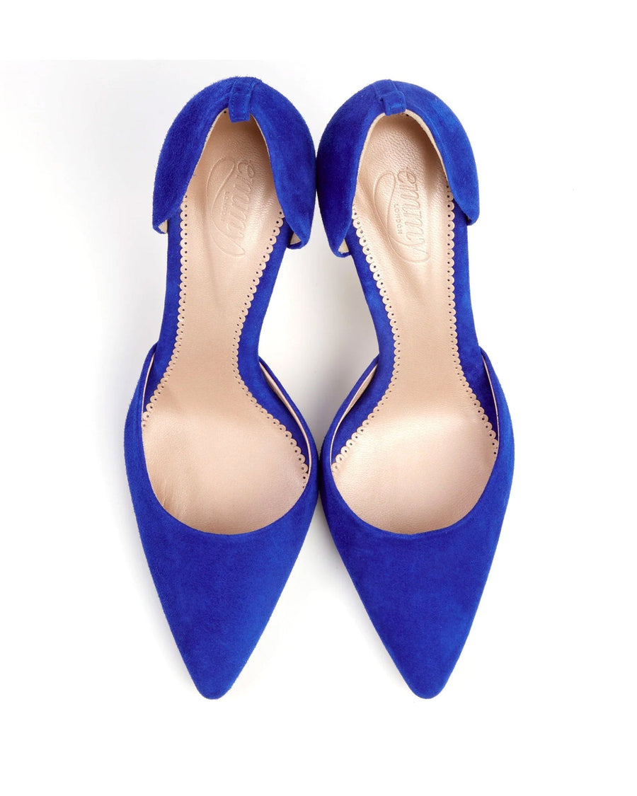 Blue suede heels with a pointed toe design, featuring an open back and a sleek silhouette. The shoes are displayed from a top-down angle against a white background, highlighting their vibrant color and elegant shape. image