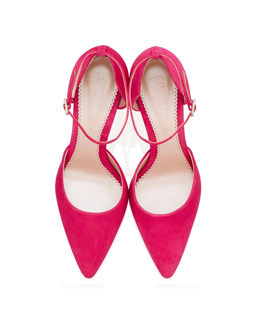 Pink suede heels with a pointed toe design and a delicate ankle strap. The shoes are displayed from a top-down angle against a white background, showcasing their elegant silhouette. image