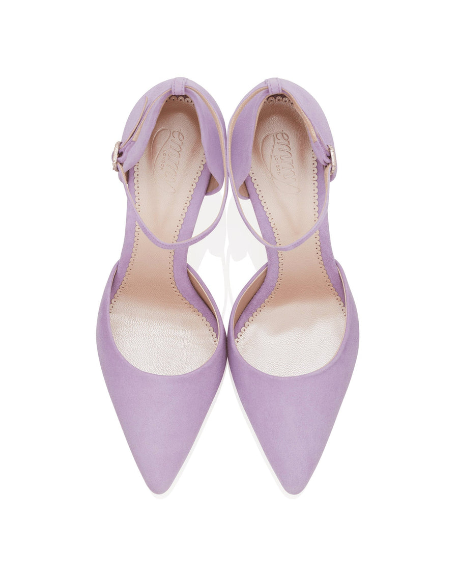 Lavender suede heels with a pointed toe design and an ankle strap. The shoes are displayed from a top-down angle against a white background, showcasing their elegant silhouette. image