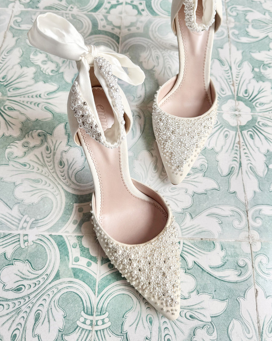 Pearl Hand-Beaded Bridal Shoes On Ornate Tiles  image