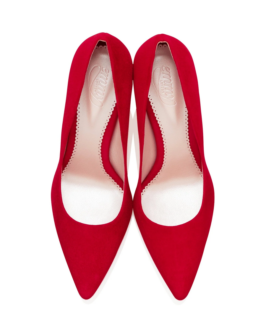 Red suede pointed-toe heels with a sleek design, featuring a smooth interior. The image is taken from a top-down angle, showcasing the shoes against a white background. image