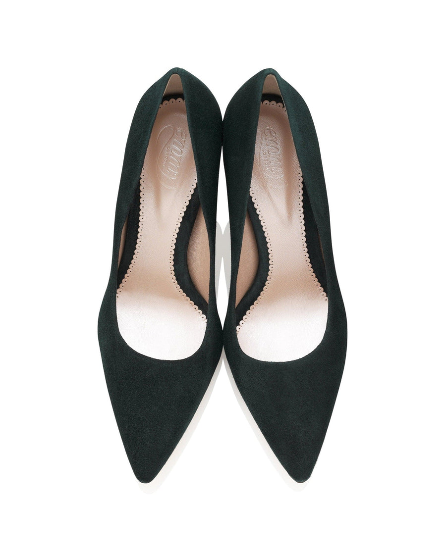 Elegant black suede heels featuring a pointed toe and a sleek cut-out design along the sides. The shoes are displayed from a top-down angle against a clean white background, highlighting their sophisticated silhouette. image