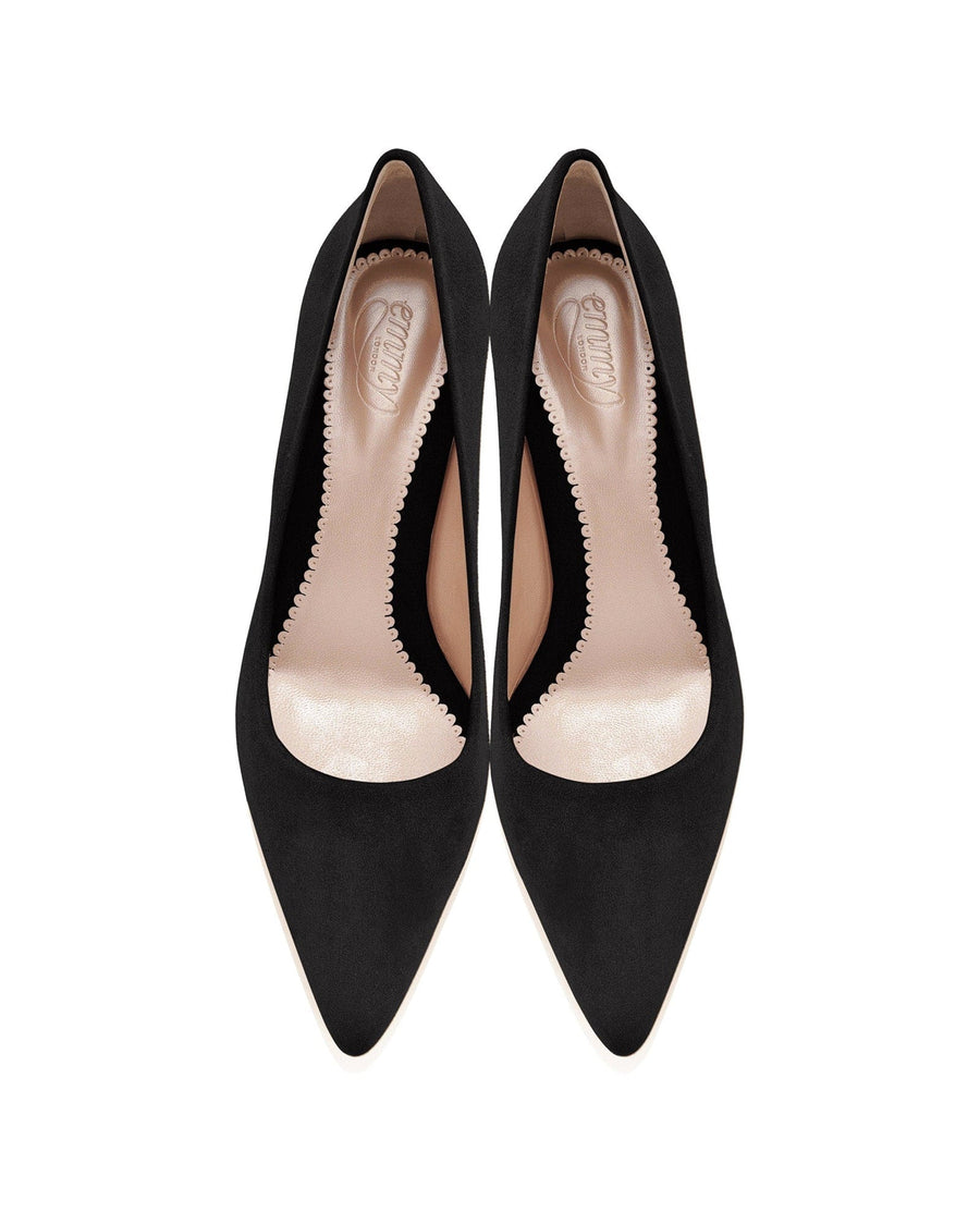 Black suede heels with a pointed toe design, featuring a smooth interior lining. The shoes are displayed from a top-down angle against a white background, highlighting their sleek silhouette. image