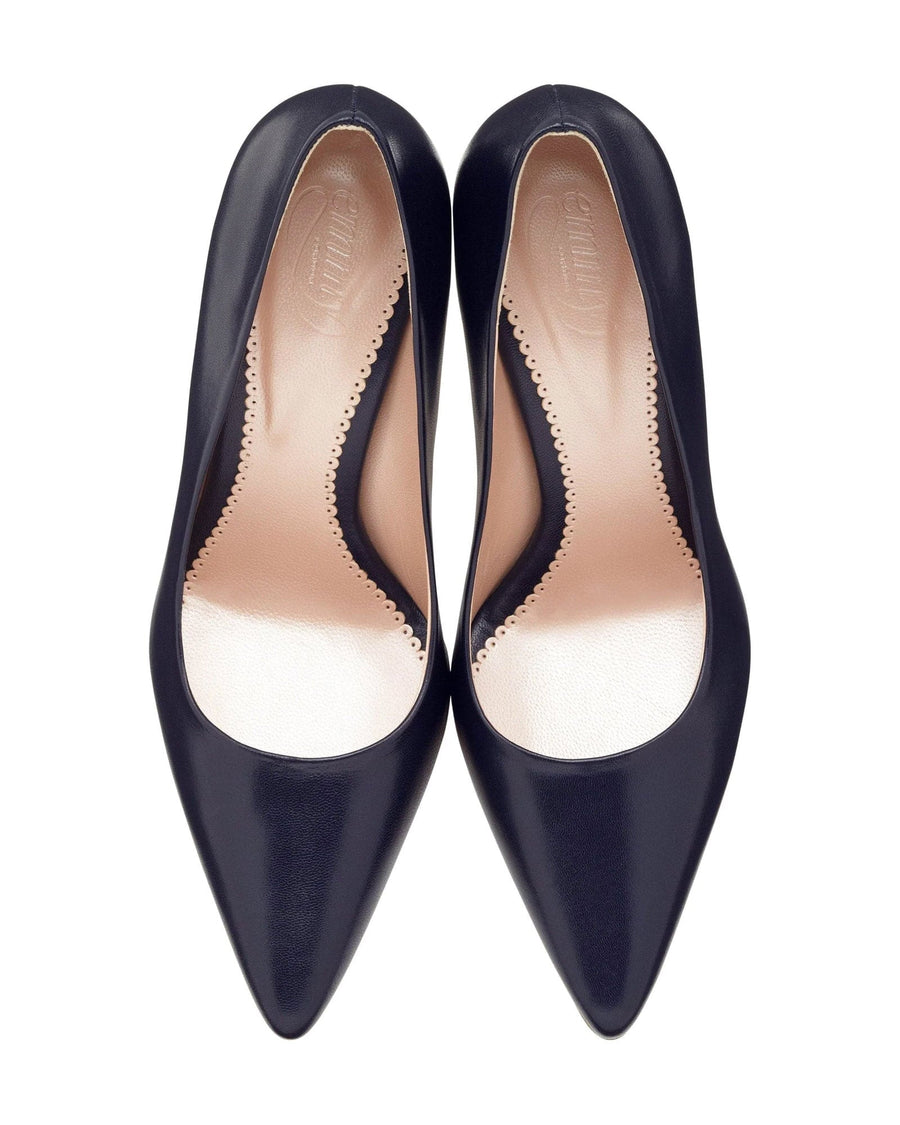 Navy leather heels with a pointed toe design, featuring a smooth finish and a subtle scalloped edge along the opening. The shoes are displayed from a top-down angle against a white background, highlighting their sleek silhouette. image