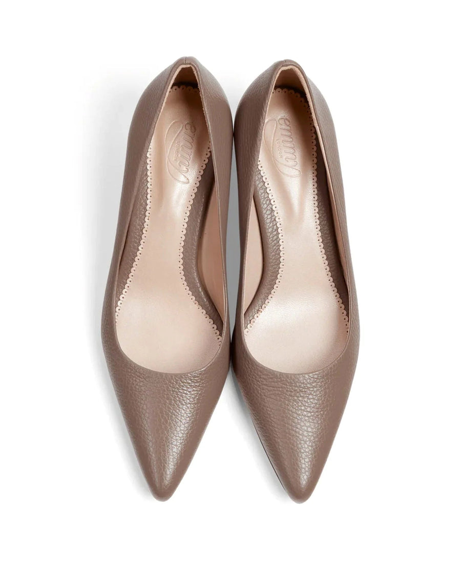 Pointed-toe heels in a soft taupe leather, featuring a sleek design with a low-cut vamp. The shoes are displayed from a top-down angle against a clean white background, emphasizing their elegant silhouette. image