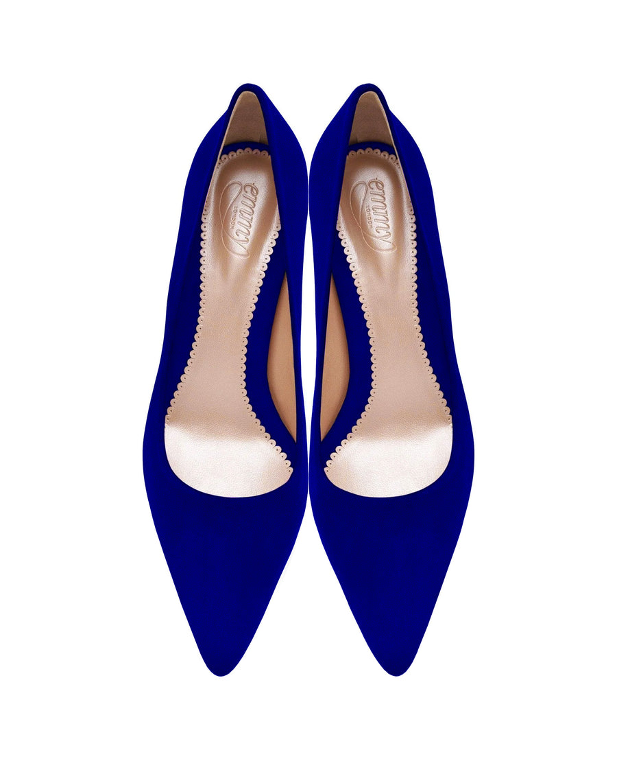 Elegant blue suede heels with a pointed toe design and a scalloped edge. The shoes are displayed from a top-down angle against a white background, showcasing their sleek silhouette. image