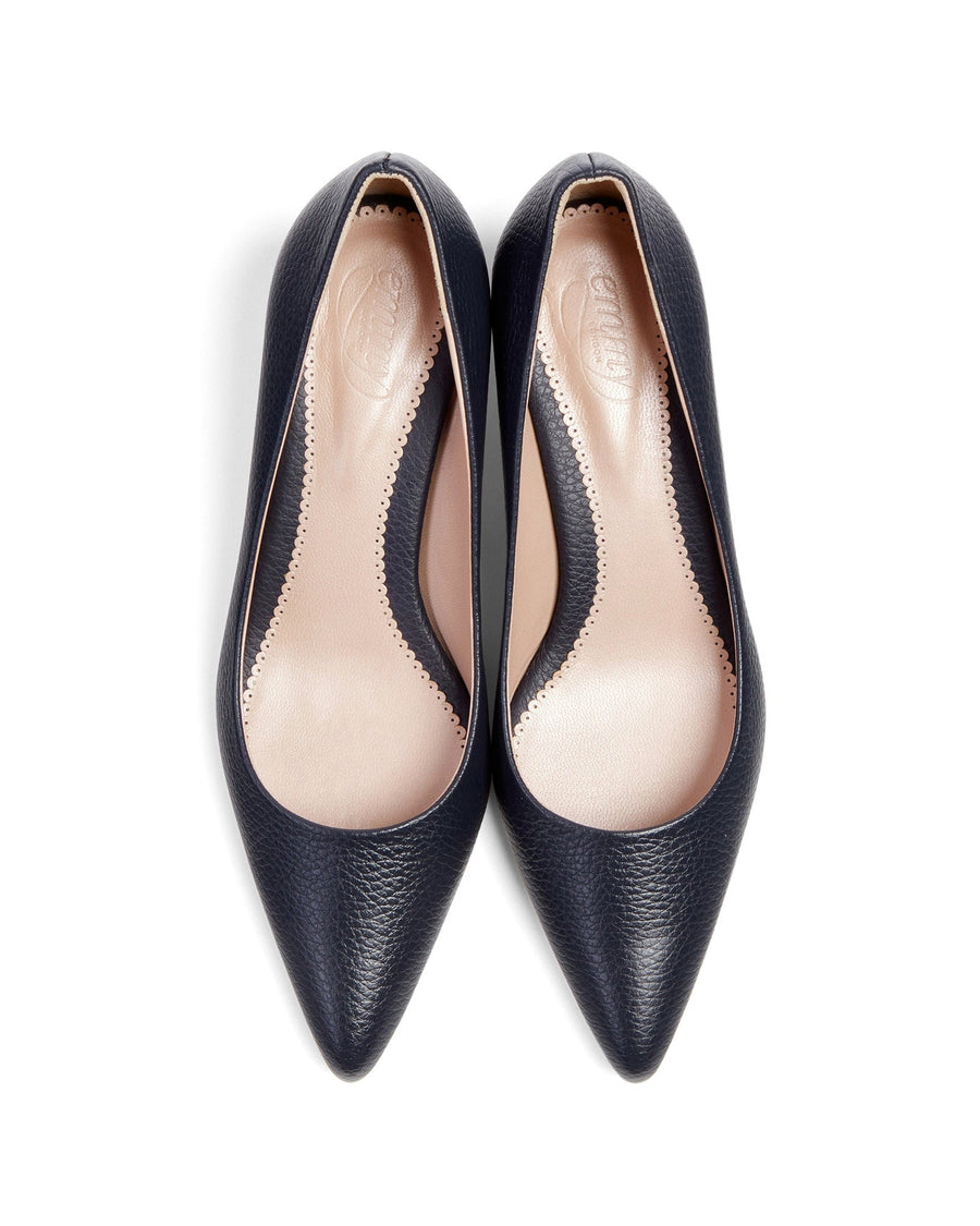 Navy leather pointed-toe pumps with a sleek design, featuring a low heel. The shoes are displayed from a top-down angle against a white background, highlighting their smooth texture and elegant silhouette. image