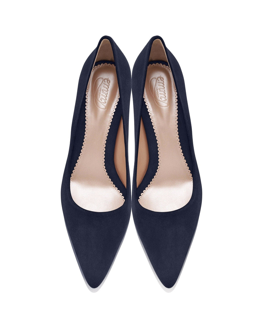 Navy suede heels with a pointed toe design, featuring a scalloped edge along the opening. The shoes are displayed from a top-down angle against a white background, highlighting their elegant silhouette. image