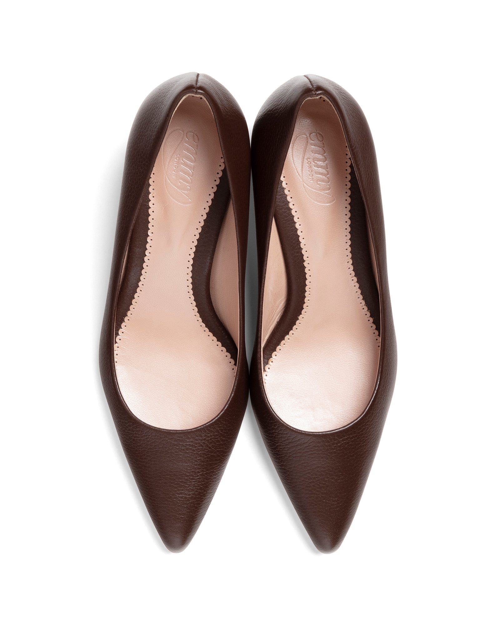 Pair of brown pointed-toe shoes on a white background image