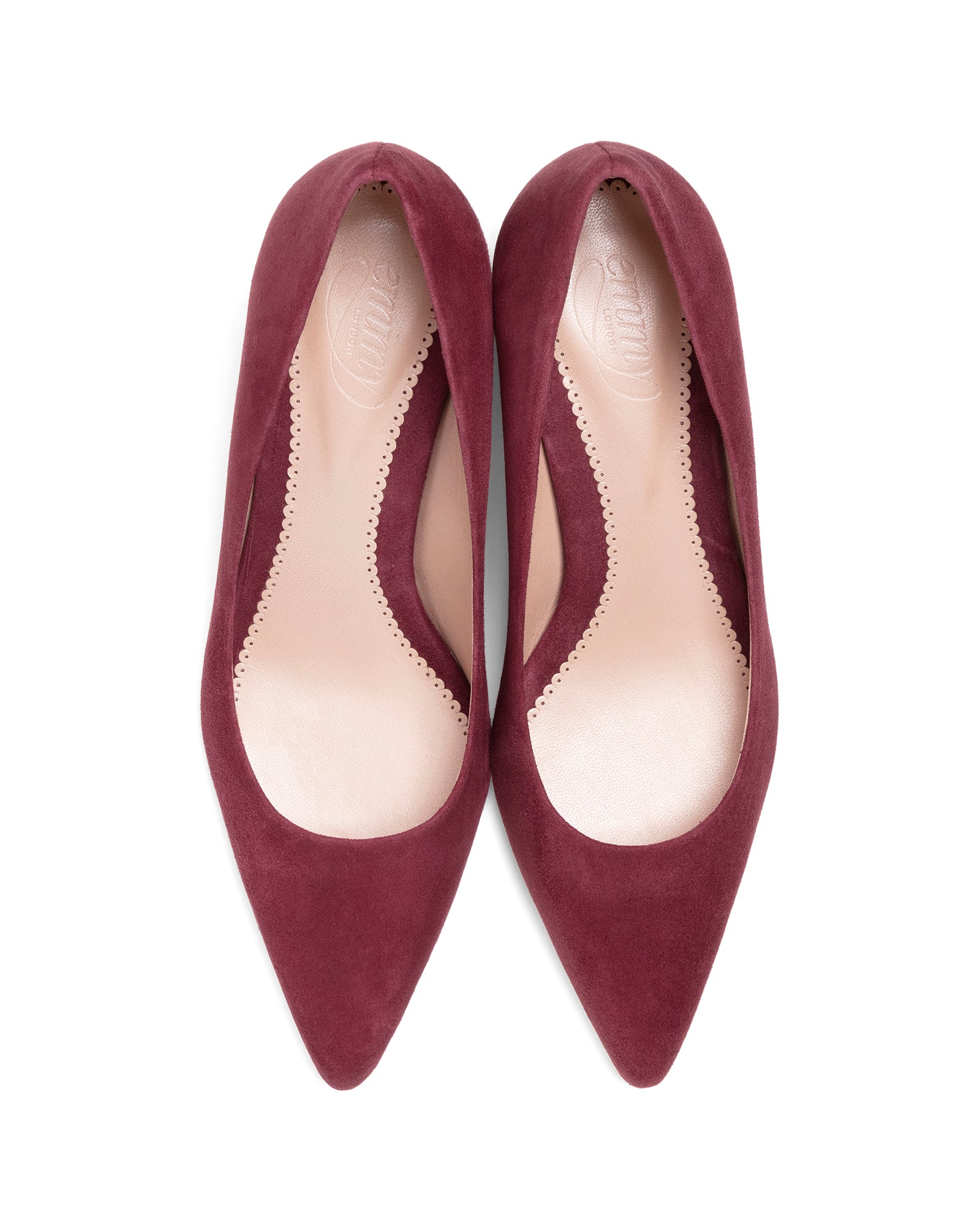 Pair of maroon pointed-toe shoes on a white background image