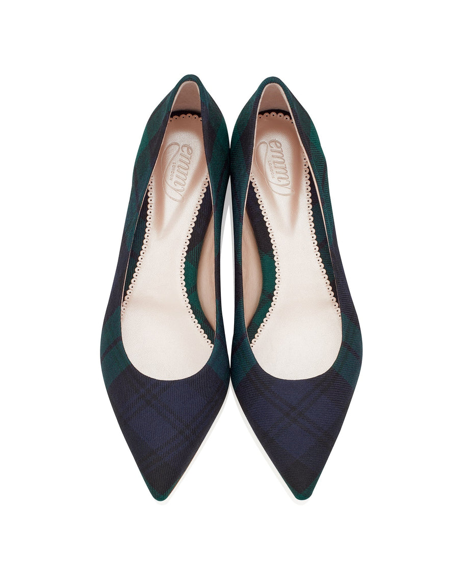 Pointed-toe heels made of tweed, featuring a dark green and navy plaid pattern. The shoes are displayed from a top-down angle against a white background, showcasing their sleek design and elegant silhouette. image