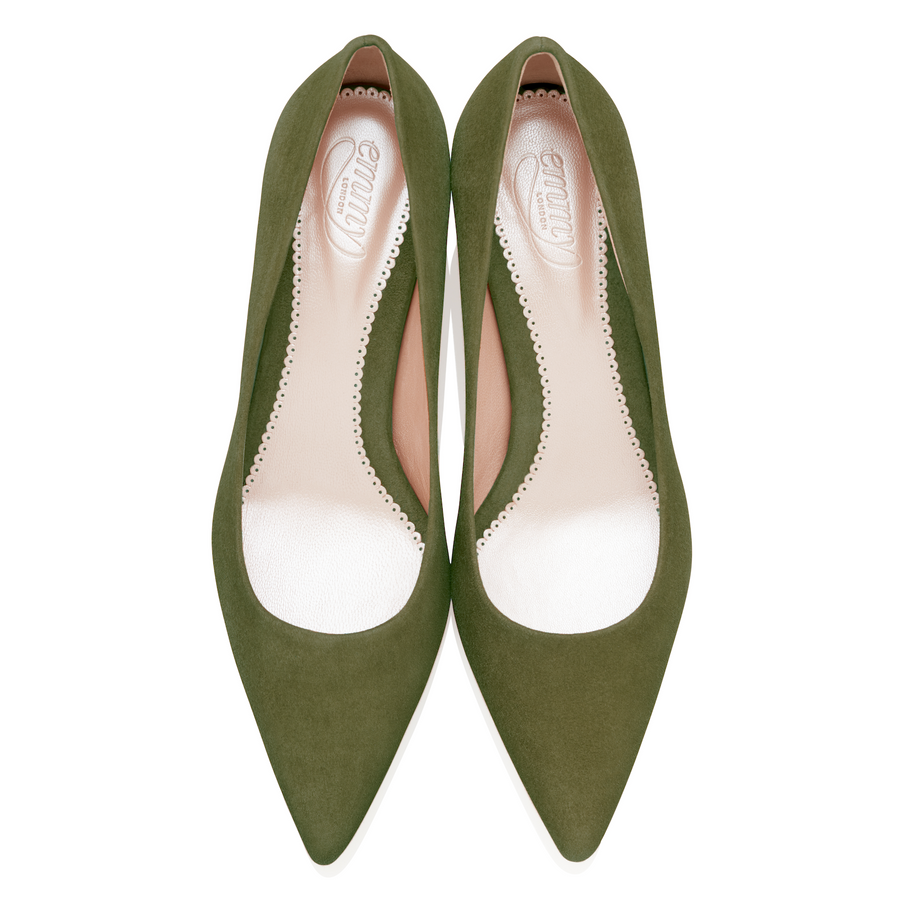 Olive green suede heels with a pointed toe design and a cut-out detail along the sides. The shoes are displayed from a top-down angle against a white background, showcasing their elegant silhouette. image