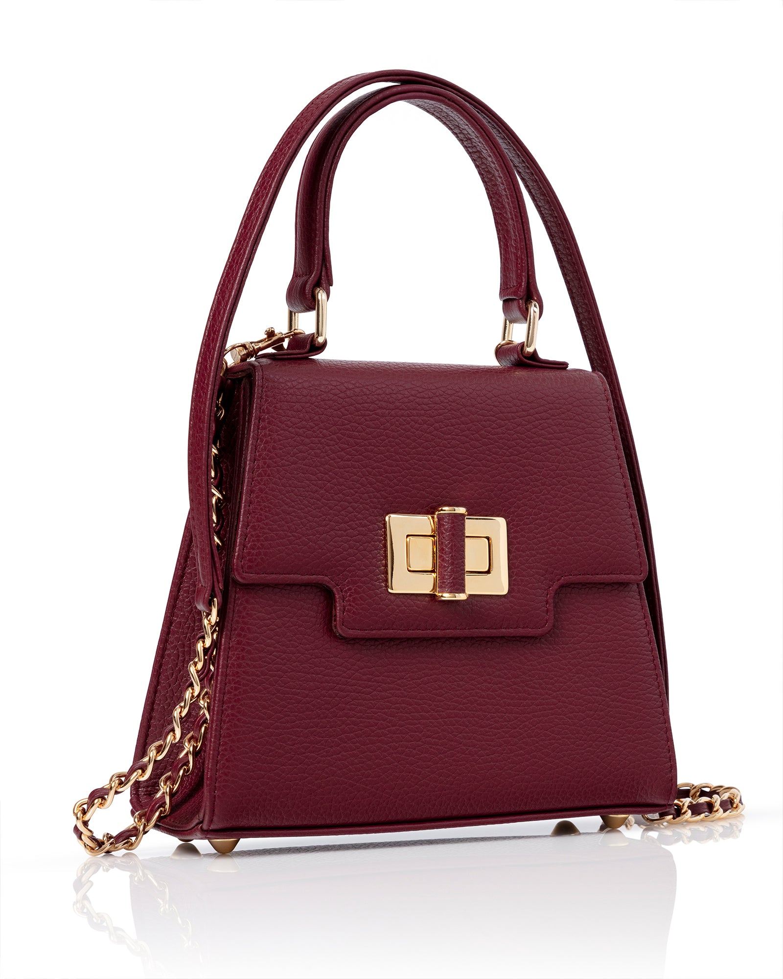 Maroon handbag with gold chain and clasp on a white background image