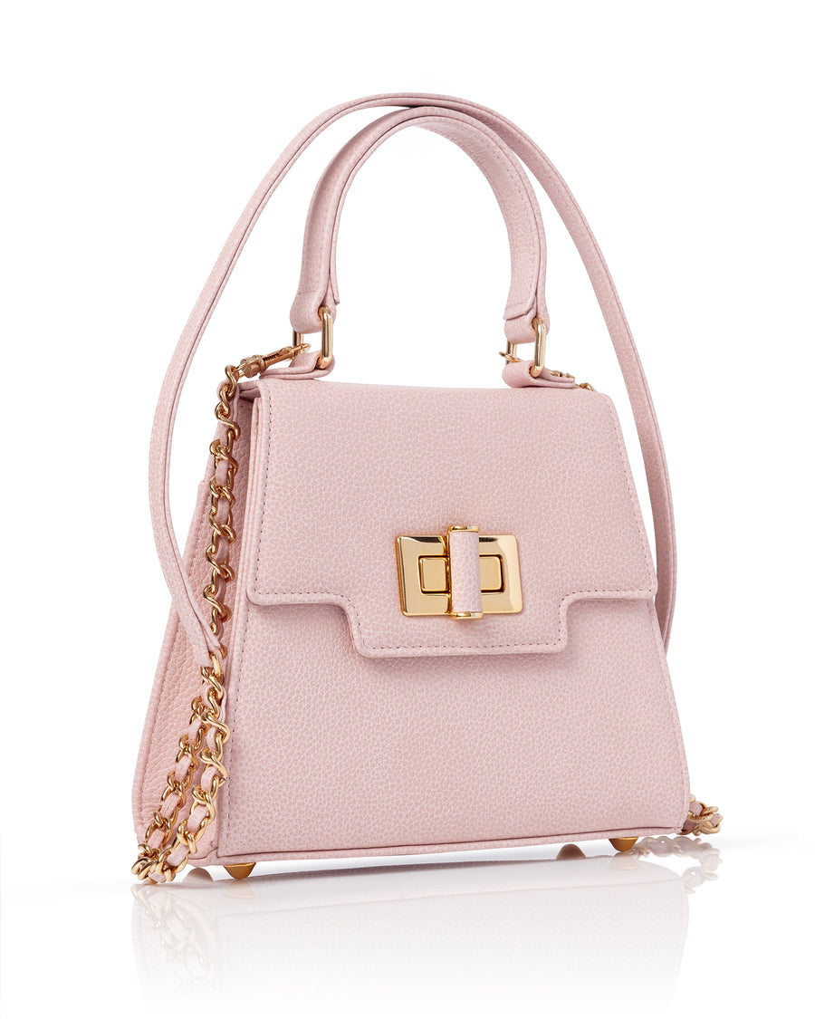Pink Hand Bag With Chain On A White Background image