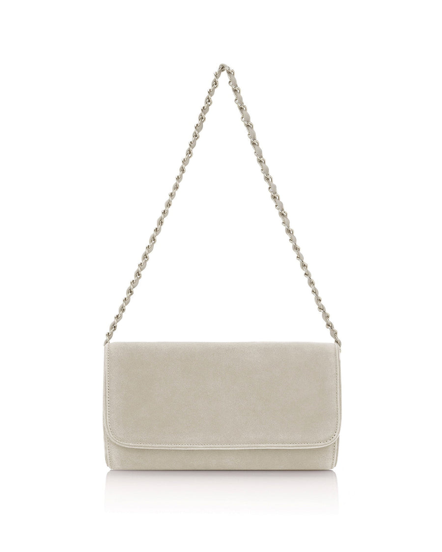 A light beige suede clutch bag with a silver chain strap, displayed against a white background. The bag features a sleek, minimalist design with a flap closure, showcasing its elegant and versatile style. image