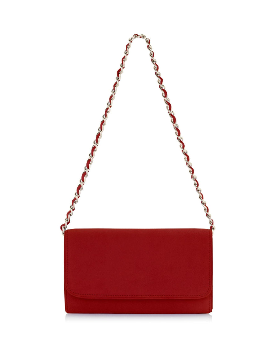 Red clutch bag with a sleek design, featuring a gold chain strap. The bag is set against a white background, showcasing its smooth texture and elegant silhouette. image