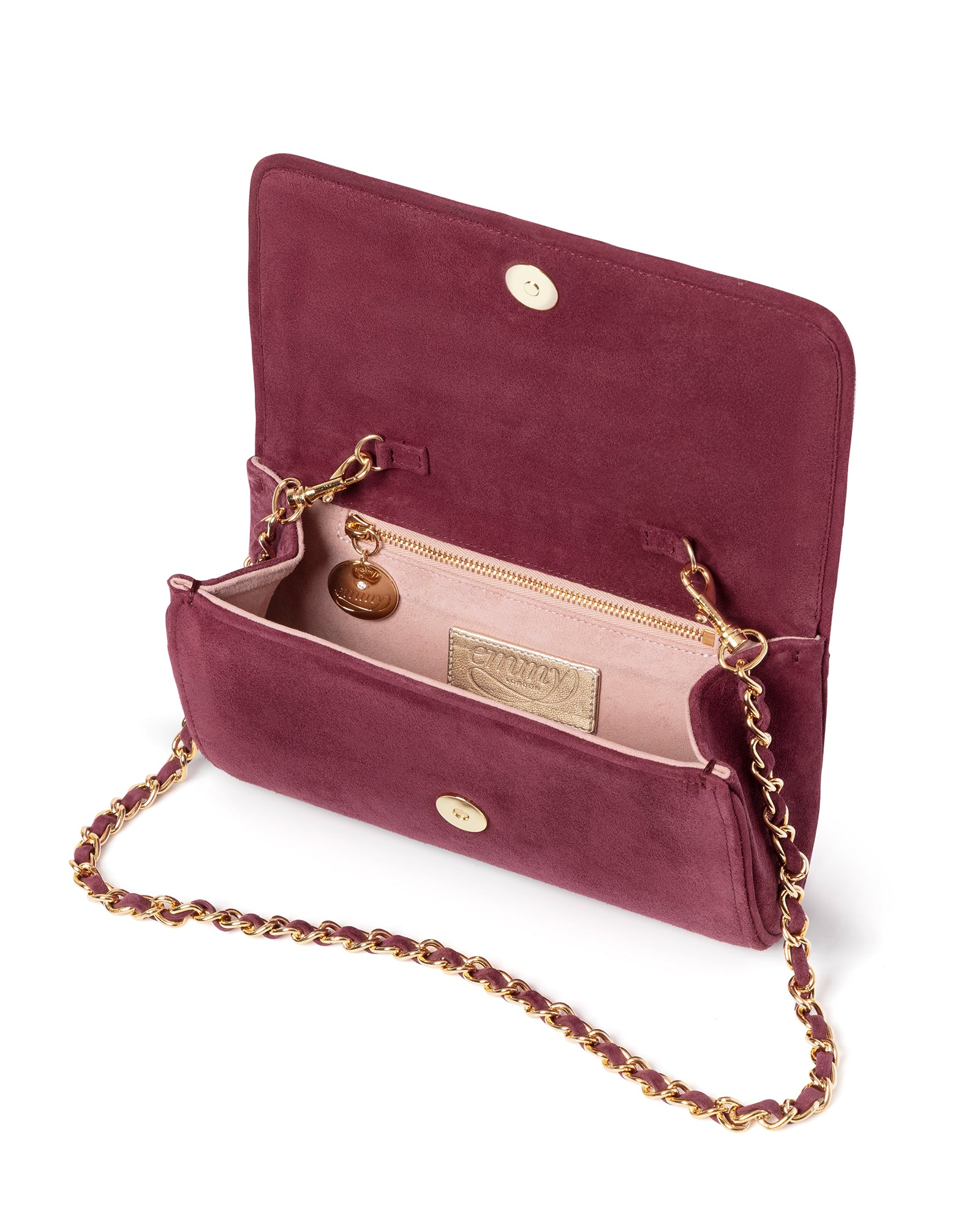Maroon handbag with gold chain strap on a white background image