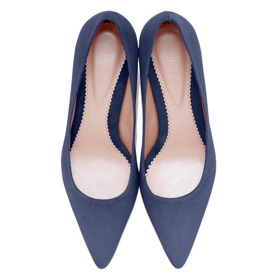 Navy blue suede pumps with a pointed toe and a low heel. The shoes feature a sleek design with cut-out sides, showcasing a smooth inner lining. The image is taken from a top-down angle against a white background, highlighting the elegant shape and texture of the material. image