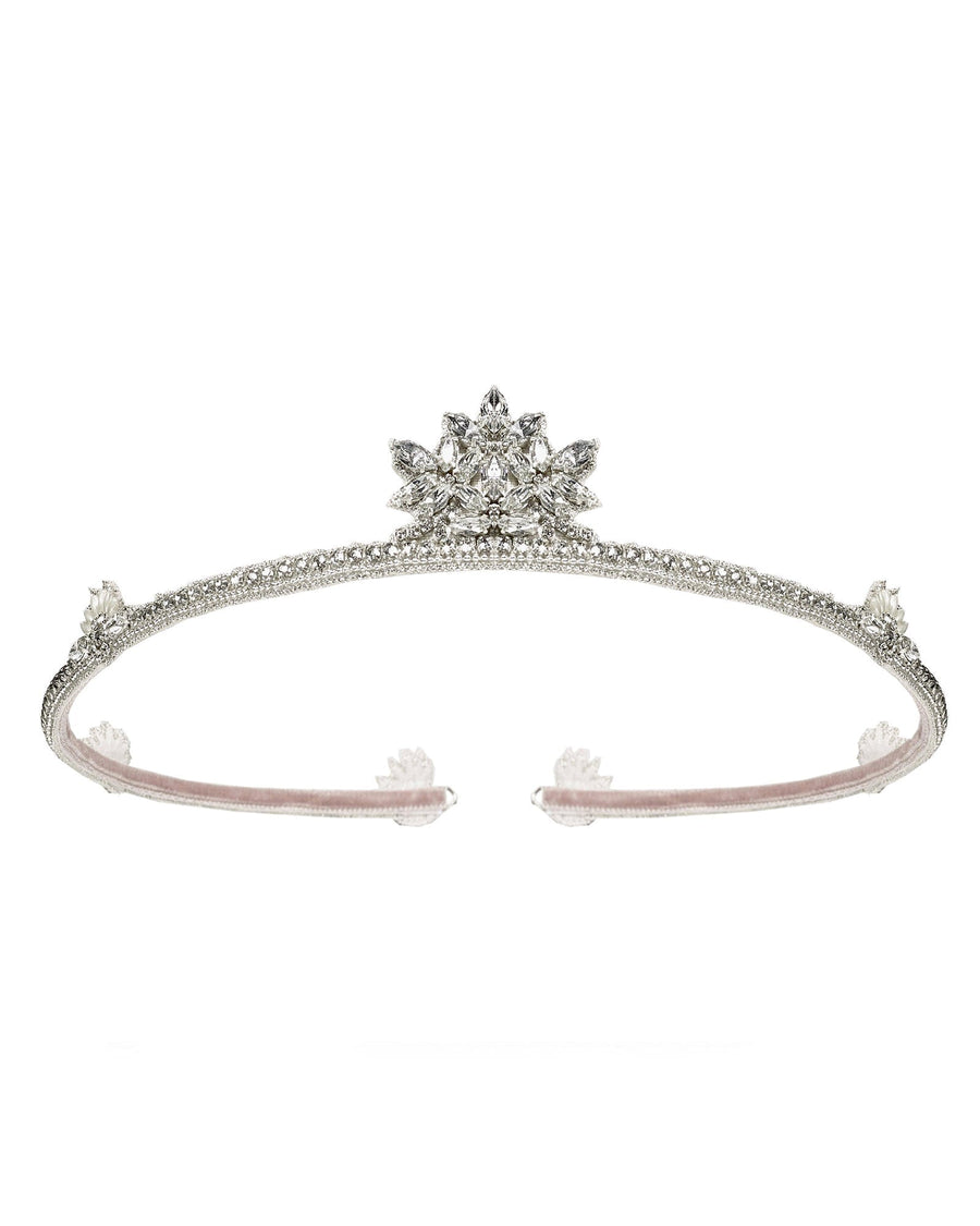 This image features a delicate silver tiara adorned with sparkling gemstones, set against a plain white background. The tiara has a graceful design with a central floral motif, showcasing intricate detailing. The angle of the image captures the tiara from the front, highlighting its elegant shape and embellishments. image