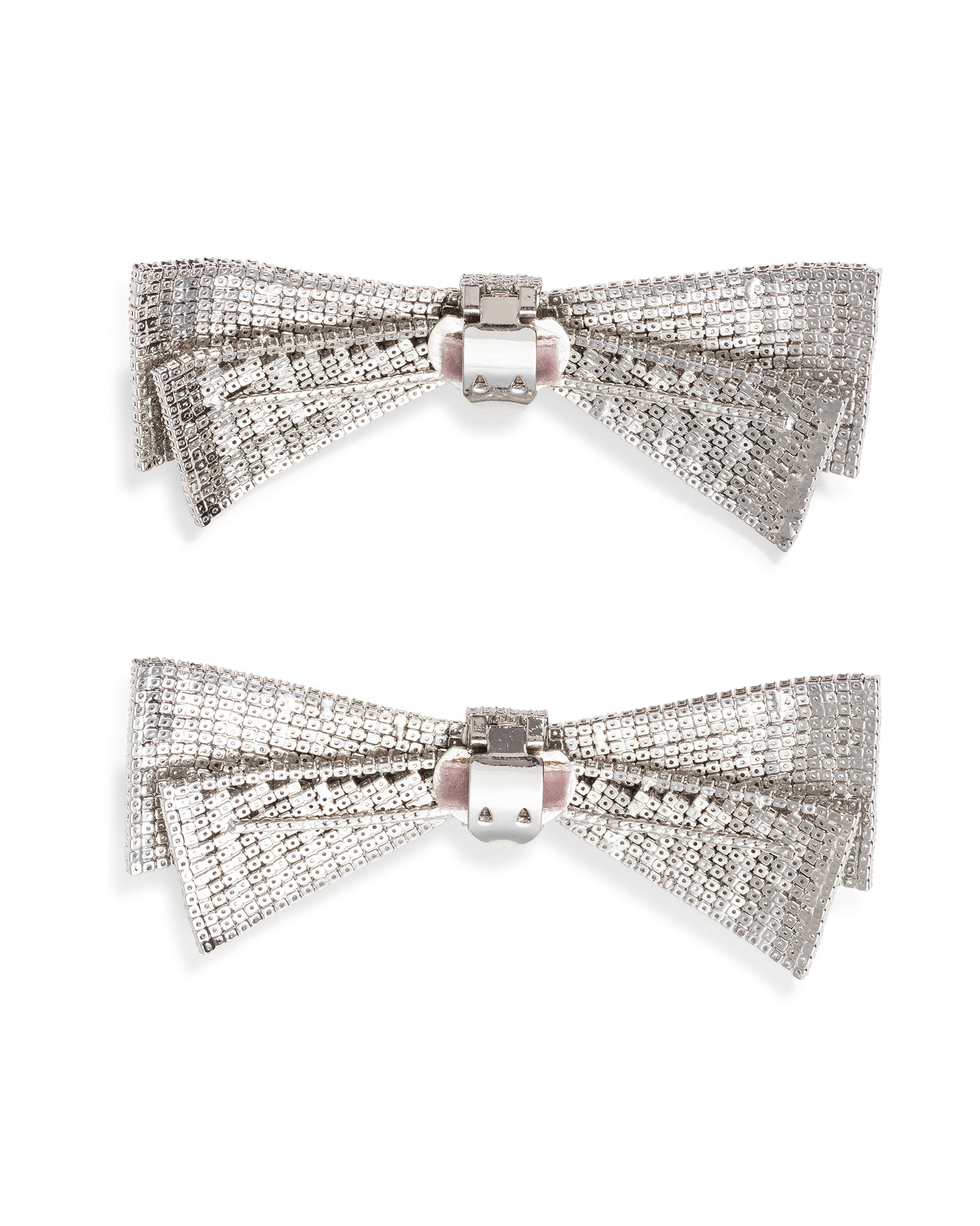 Two metallic silver shoe clip bows with a  on a white background image