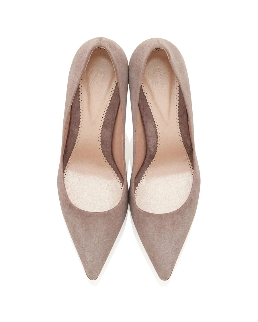 Block-heeled shoes in a soft taupe suede material, featuring a pointed toe and a sleek silhouette. The heel height is approximately 3.5 inches. The image is taken from a side angle against a neutral background, showcasing the shoe's elegant design. image