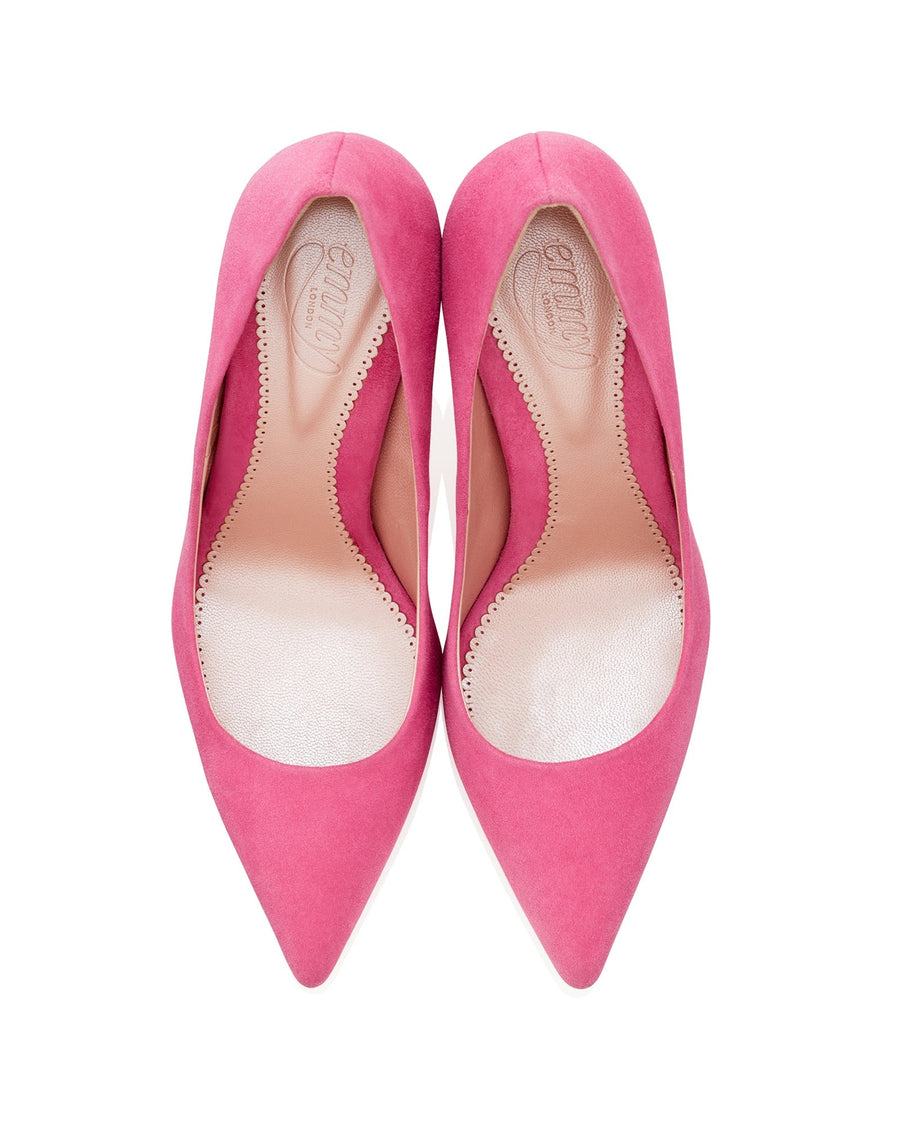 Pink suede heels with a pointed toe design, featuring a sleek silhouette. The shoes are displayed from a top-down angle against a white background, highlighting their smooth texture and elegant shape. image