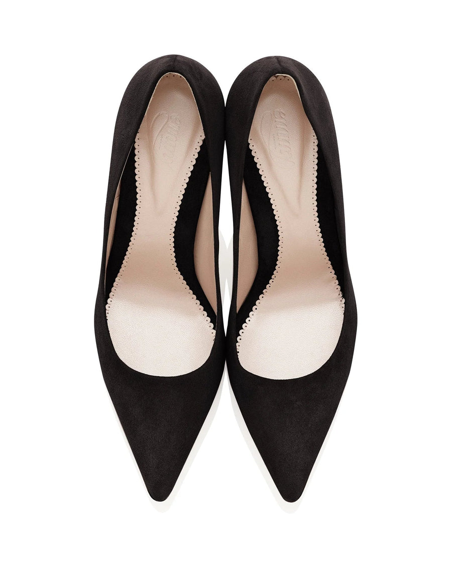 Black suede heels with a pointed toe design, featuring a sleek silhouette. The shoes are shown from a top-down angle against a white background, highlighting the smooth interior lining and the contrasting black exterior. image