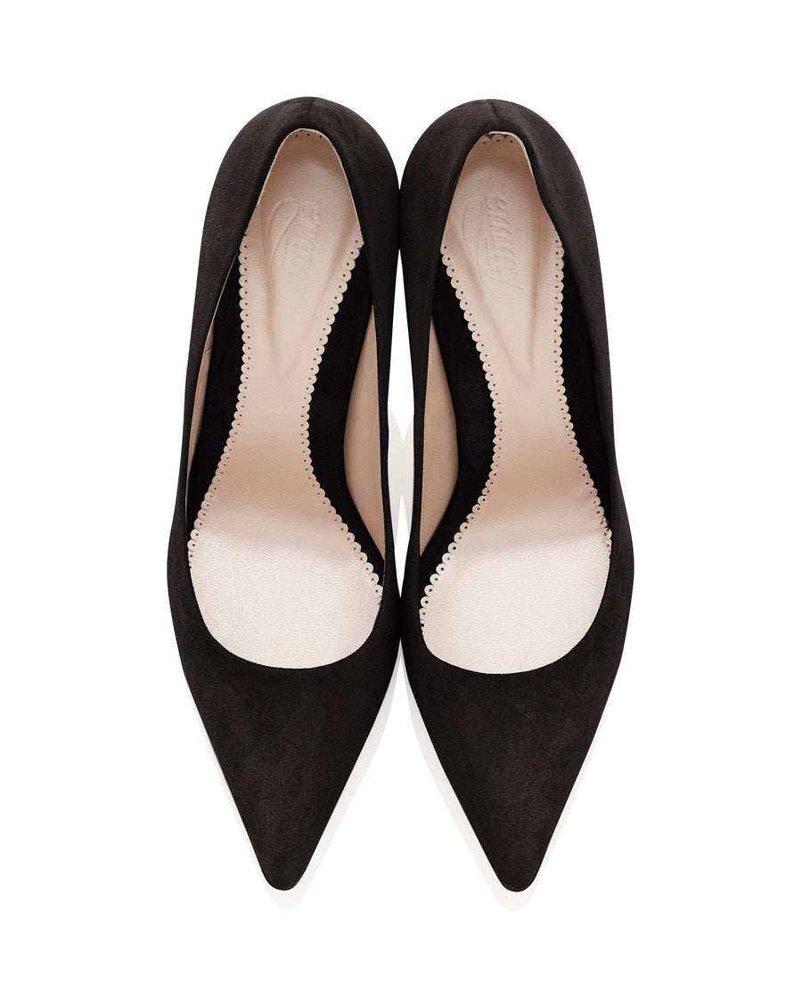 Black suede heels with a pointed toe design, featuring a sleek silhouette. The shoes are displayed from a top-down angle against a plain white background, highlighting the smooth interior and the contrasting texture of the suede. image