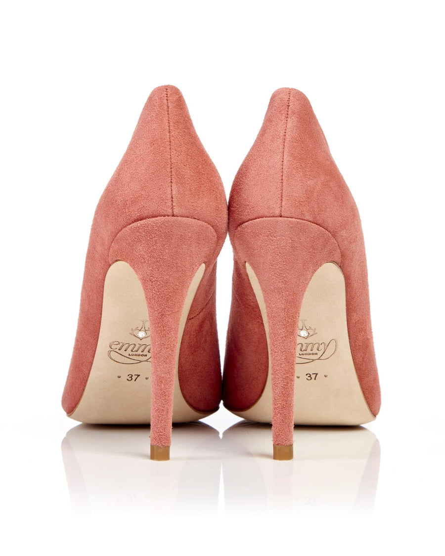Pink suede high heels with a pointed toe, displayed from the back against a white background. The shoes feature a sleek design and a stiletto heel. image