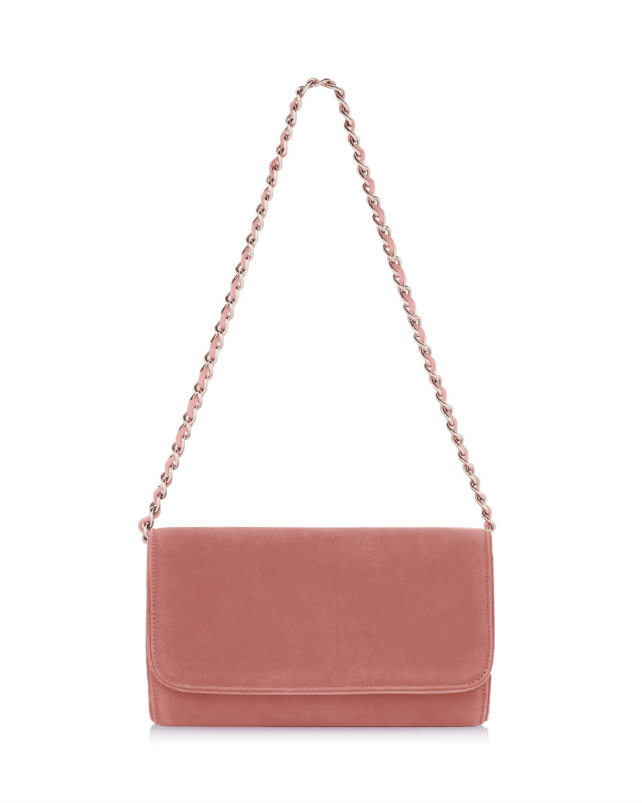 Pink leather clutch bag with a chain strap, displayed against a white background. The bag features a sleek, minimalist design with a flap closure, showcasing a smooth texture. image