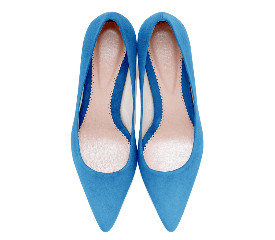 Blue suede pointed-toe heels with a sleek design, featuring a smooth inner lining. The shoes are displayed from a top-down angle against a white background, showcasing their elegant silhouette. image