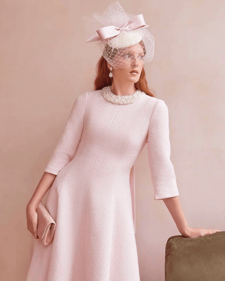 zara tindall garden party dress Zara Tindall brought elegance and practicality to the Prince and Princess of Wales garden party. She wore a beautiful pink and white floral dress. The event featured the royal family mingling with