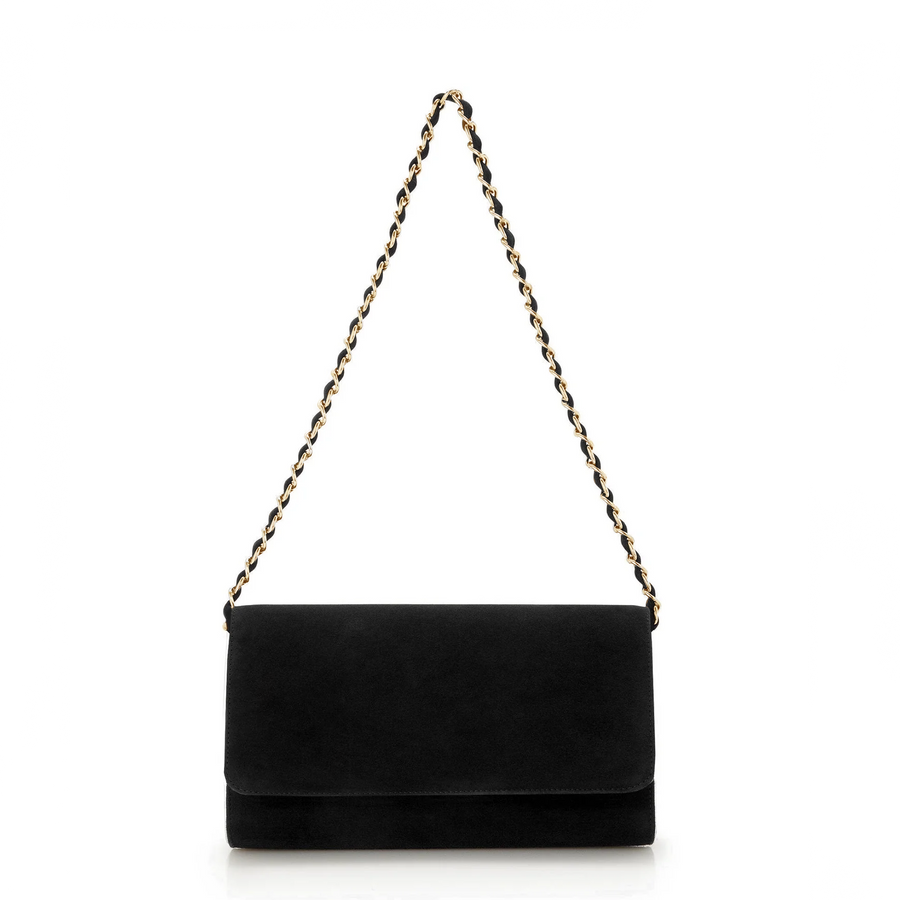 Black suede clutch bag with a gold chain strap, displayed against a white background. The bag features a sleek, minimalist design with a flap closure, showcasing its elegant silhouette. image