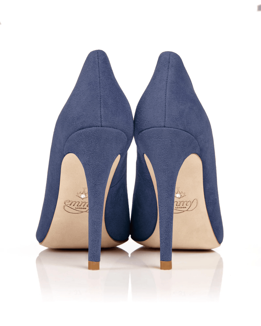 Navy blue suede high heels with a sleek design, featuring a pointed toe and a stiletto heel. The image is taken from the back, showcasing the smooth texture of the material and the elegant silhouette. The background is plain white, emphasizing the shoes. image